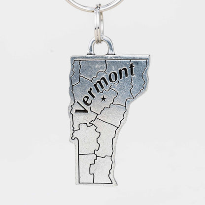 Danforth Pewter State of Vermont Keyring. Outline of the State with Vermont written across the center. Alternate view