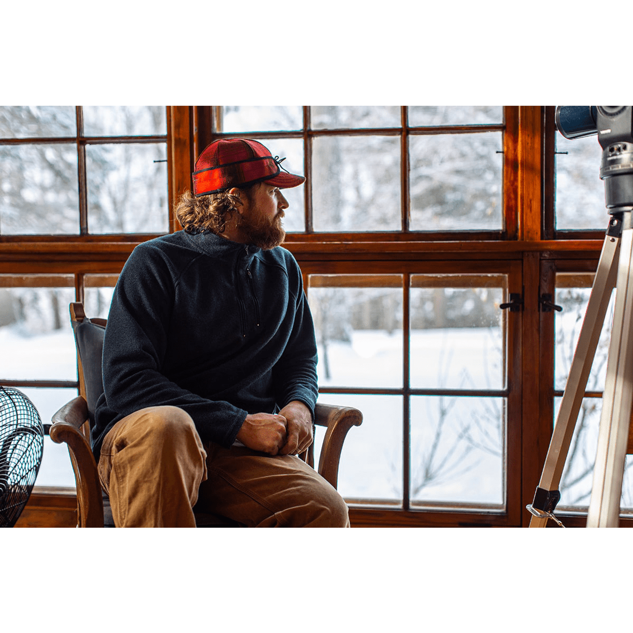 Model wearing Stormy Kromer Mackinaw black and red wool hat