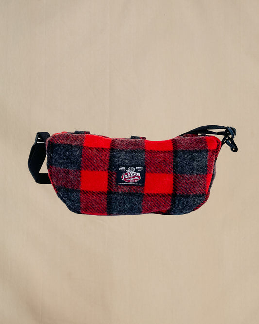 Wool sidewinder bag with strap - bag with zipped closure and belt loops for wearing on your waist plus shoulder strap. Shown in red and gray plaid