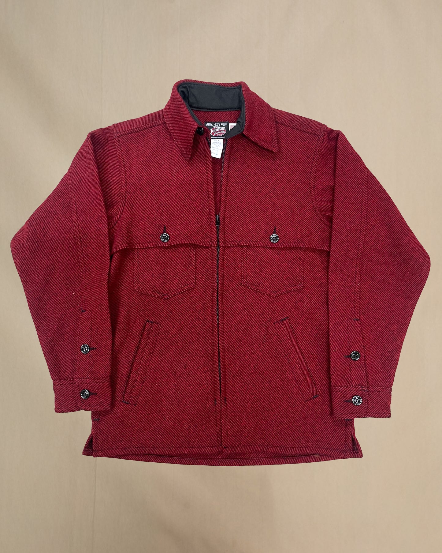 Wool jac shirt with full zipper, two chest pockets and two lower slash pockets. Shown in wine twill