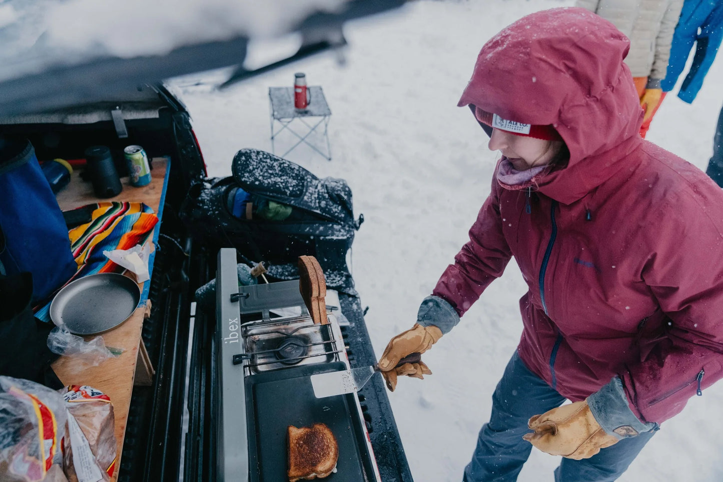 Vermont Glove Uphill Skier Glove on model grilling