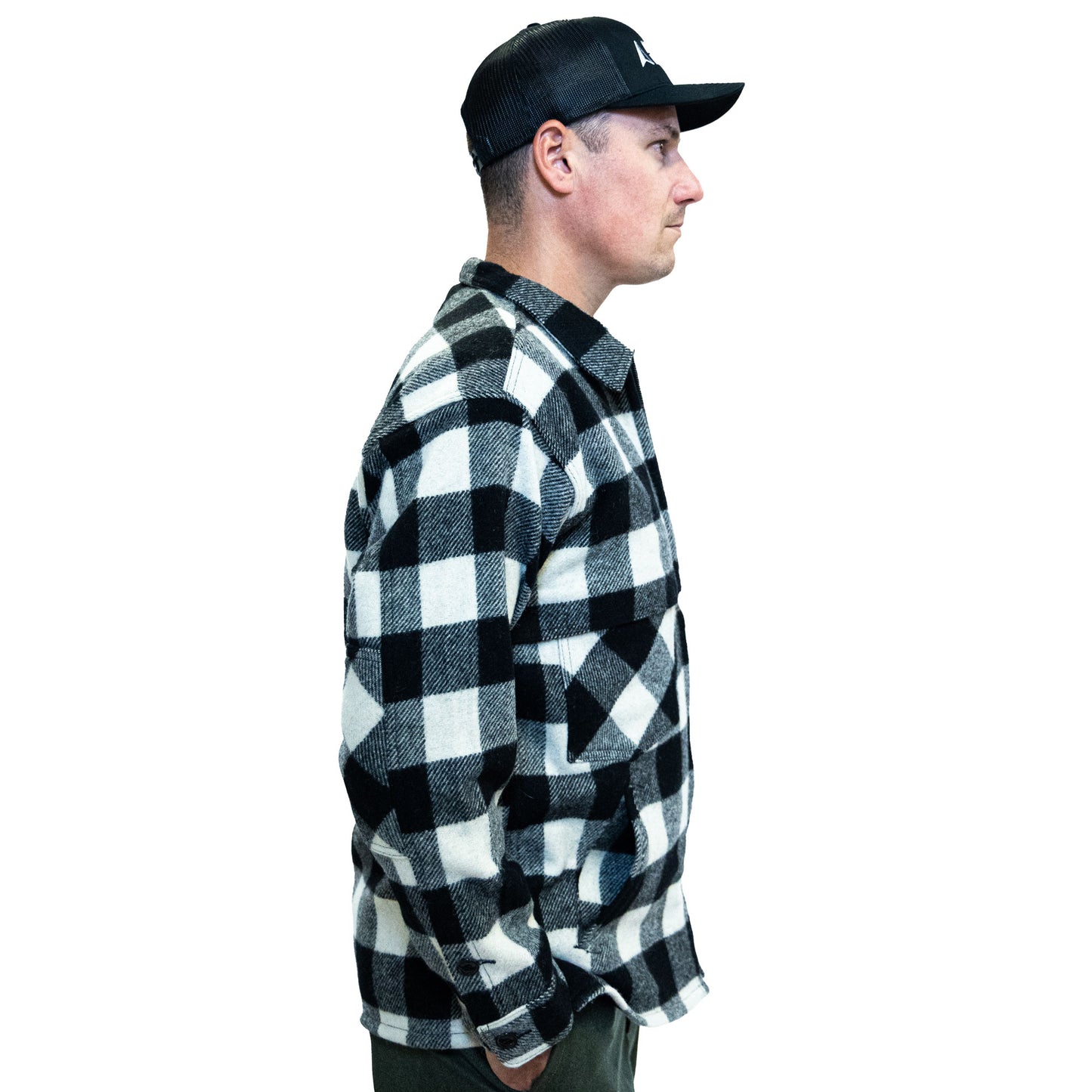 Johnson Woolen Mills northwoods x 1842 white and black buffalo check wool hunting jac shirt side view of model