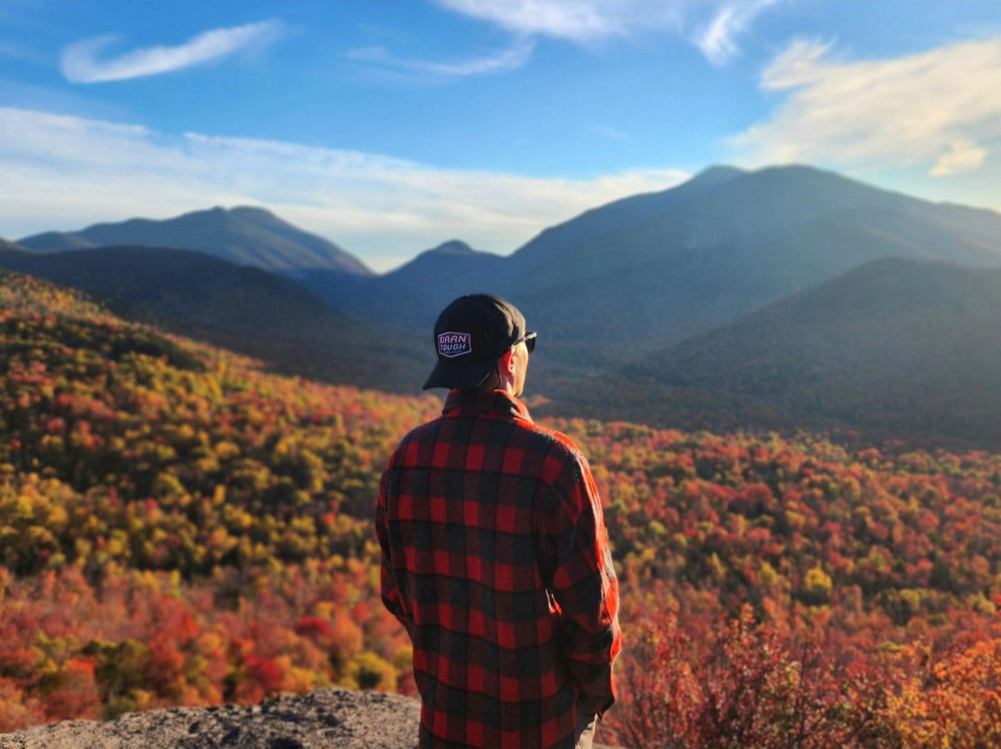 Long tail wool button down shirt on model hiking