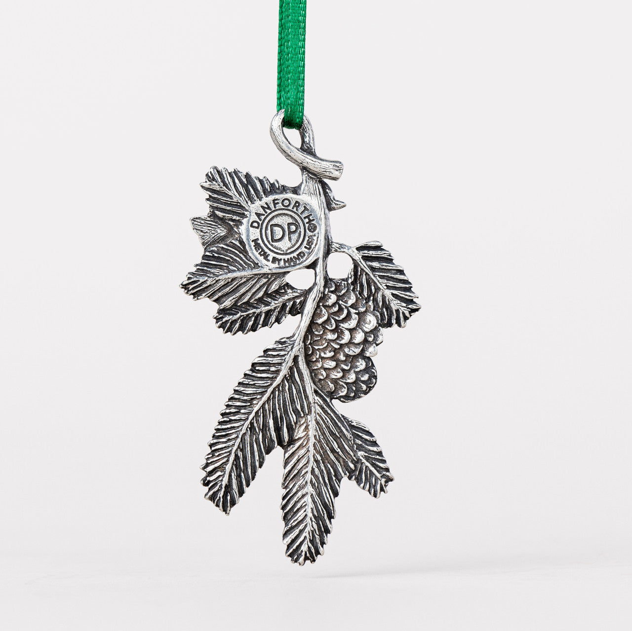 Danforth Pewter Bird on a Bough Carded Ornament. Backside of ornament with Danforth Pewter Touch Mark.