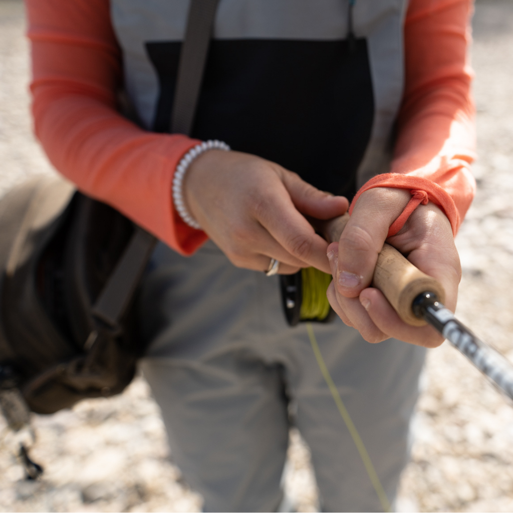 Women's Nuyarn® Merino Lightweight Hoodie on model fly fishing