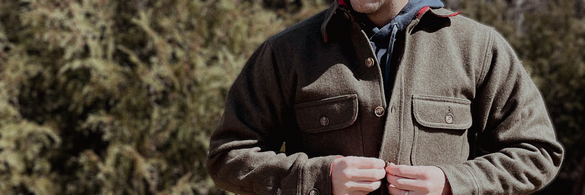 Loden jac shirt on model with trees in background