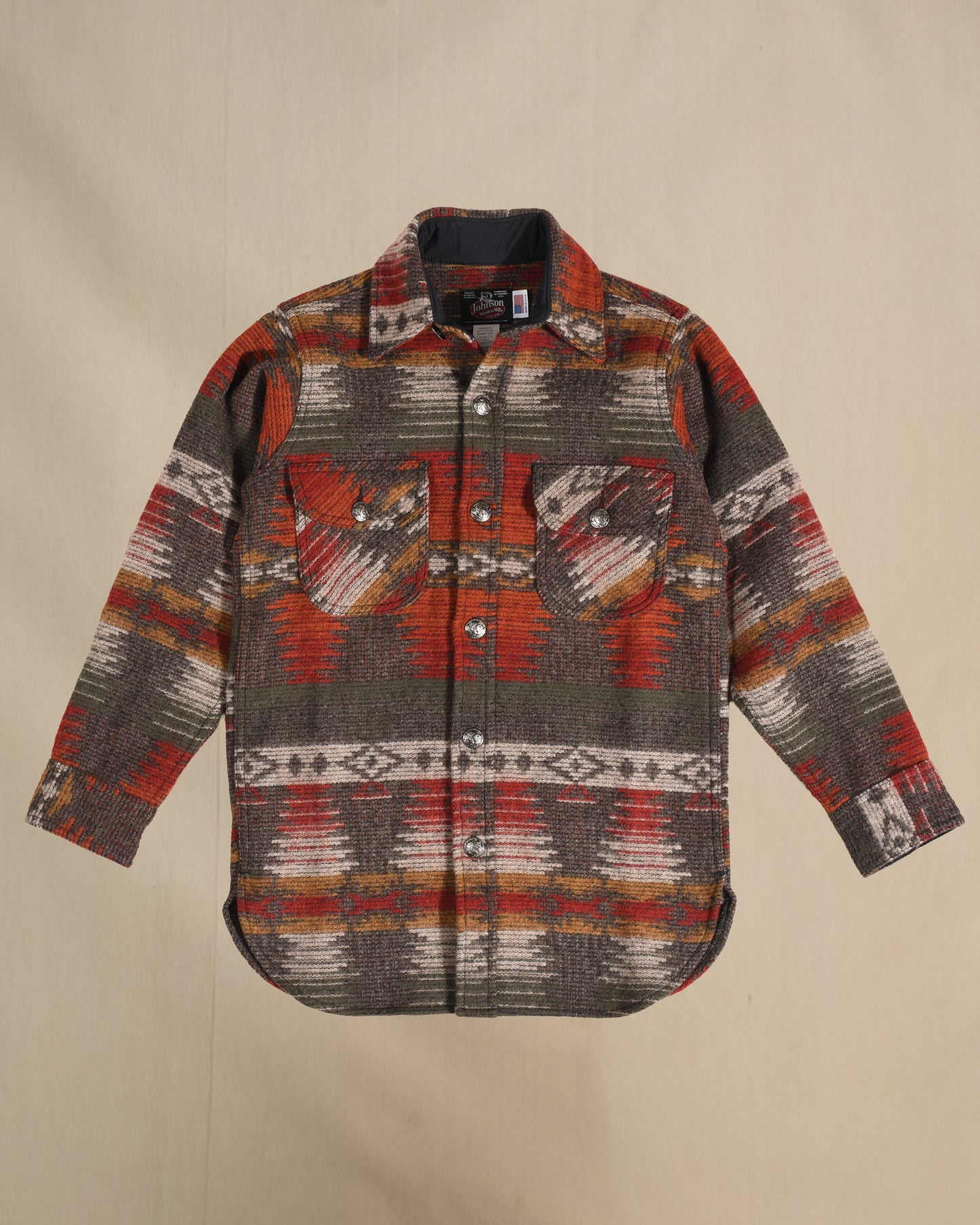 Patterned wool shirt with a collar on a beige background