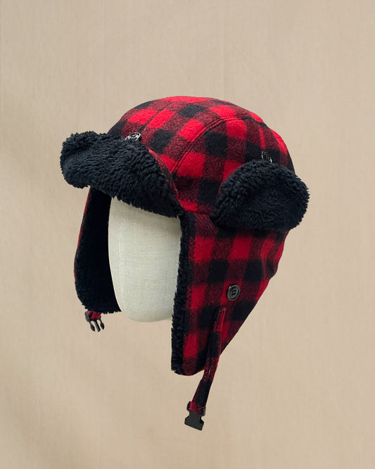Red and black buffalo plaid wool bomber style hat with black sherpa fleece lining around rim and visor.