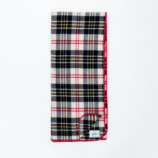 Johnson Woolen Mills throw - black, white, yellow, red with red stitching and logo - full view