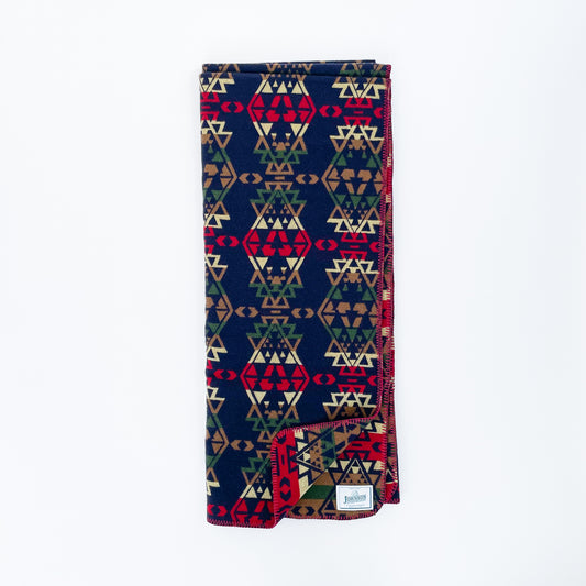 Johnson Woolen Mills throw - blue, red, yellow, tan with red stitching -- full view