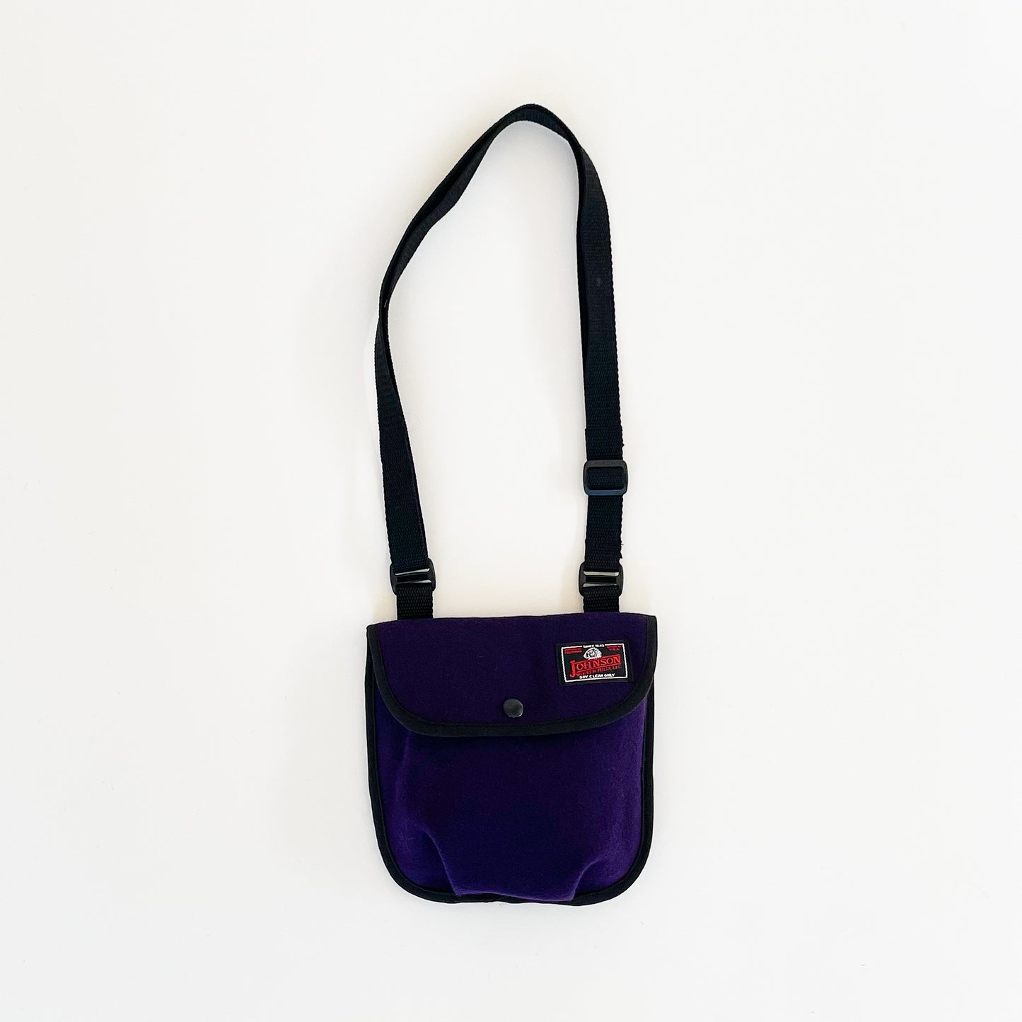 Wool swing back - black powder pouch with added shoulder strap.  Shown in purple.