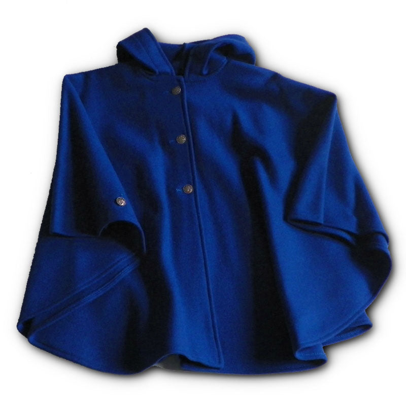 Wool cape with three Norwegian pewter buttons with matching button on sleeve, and a large hood. Shown in royal blue.