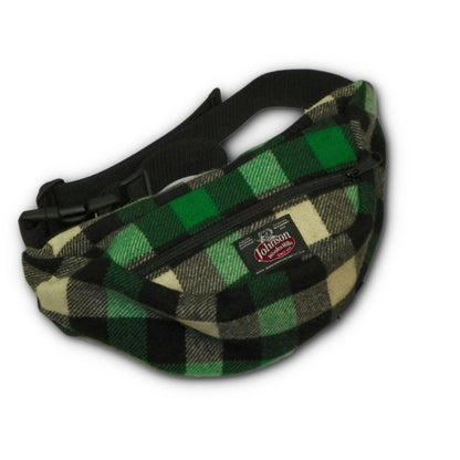 Wool fanny pack with zipper closure and nylon waistband with buckle, shown in green, black and ivory buffalo plaid