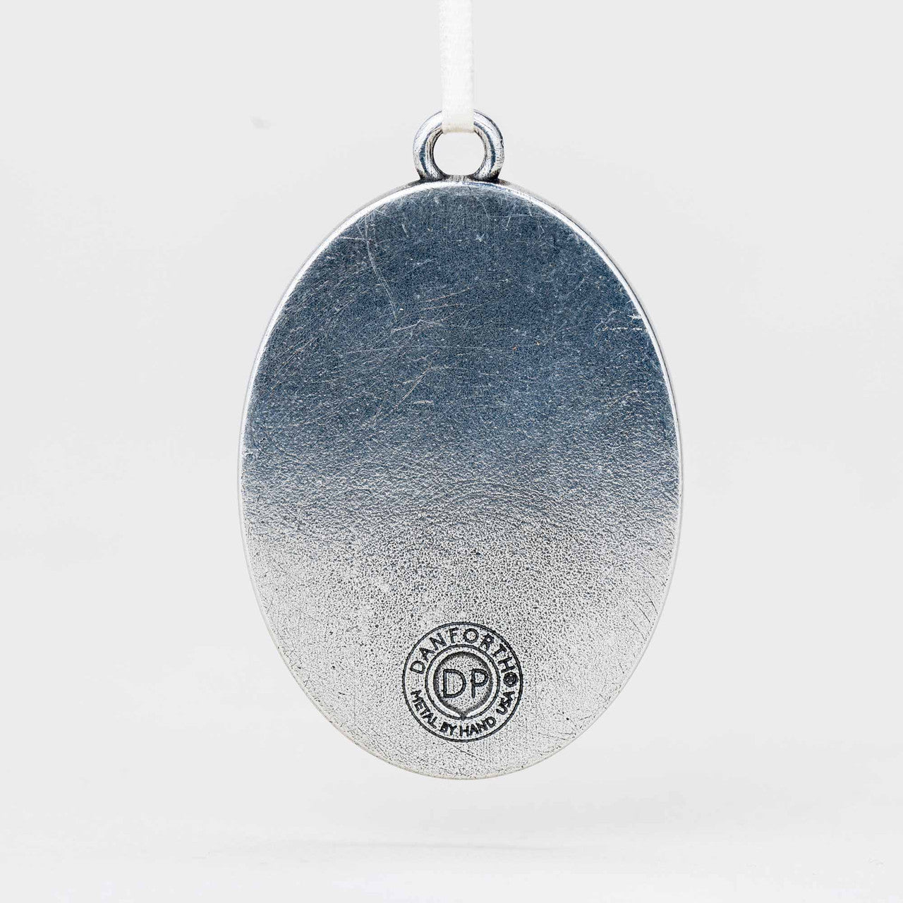 Silver pendant with 'Danforth' branding on a white background