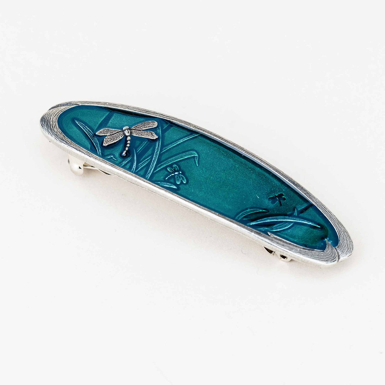 Danforth Pewter Dragonfly Teal Large Barrette. Silver butterfly with teal background. View shows french style spring clasp.