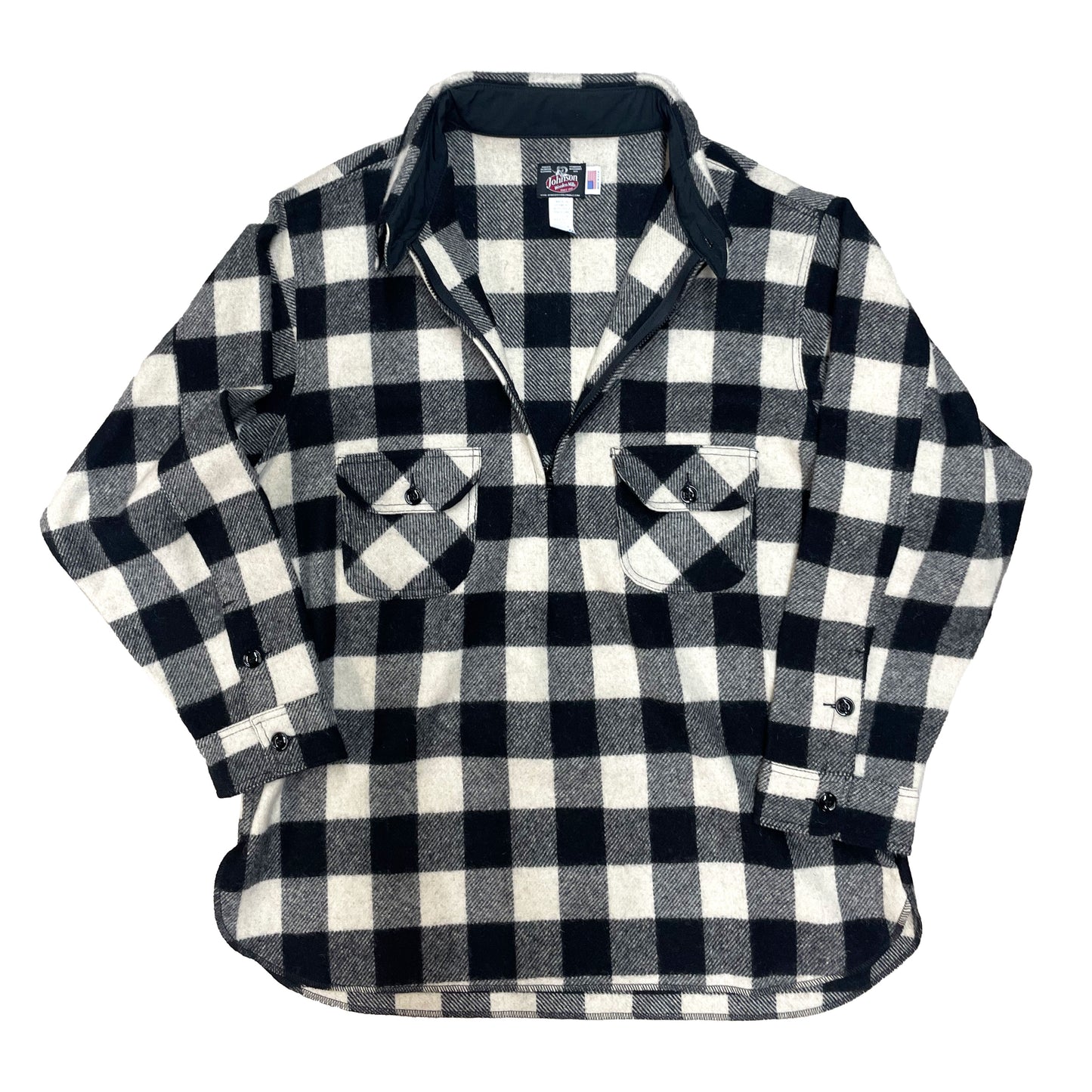 Half Zip Wool shirt - pull over design with a long rounded tail, half zip and two chest pockets. Shown in white and black buffalo plaid. zipper down