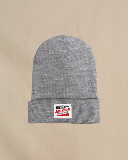 Gray beanie with a Johnson logo on a beige background