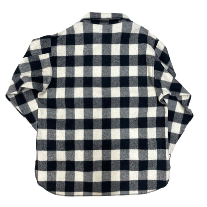 Half Zip Wool shirt - pull over design with a long rounded tail, half zip and two chest pockets. Shown in white and black buffalo plaid. Back side