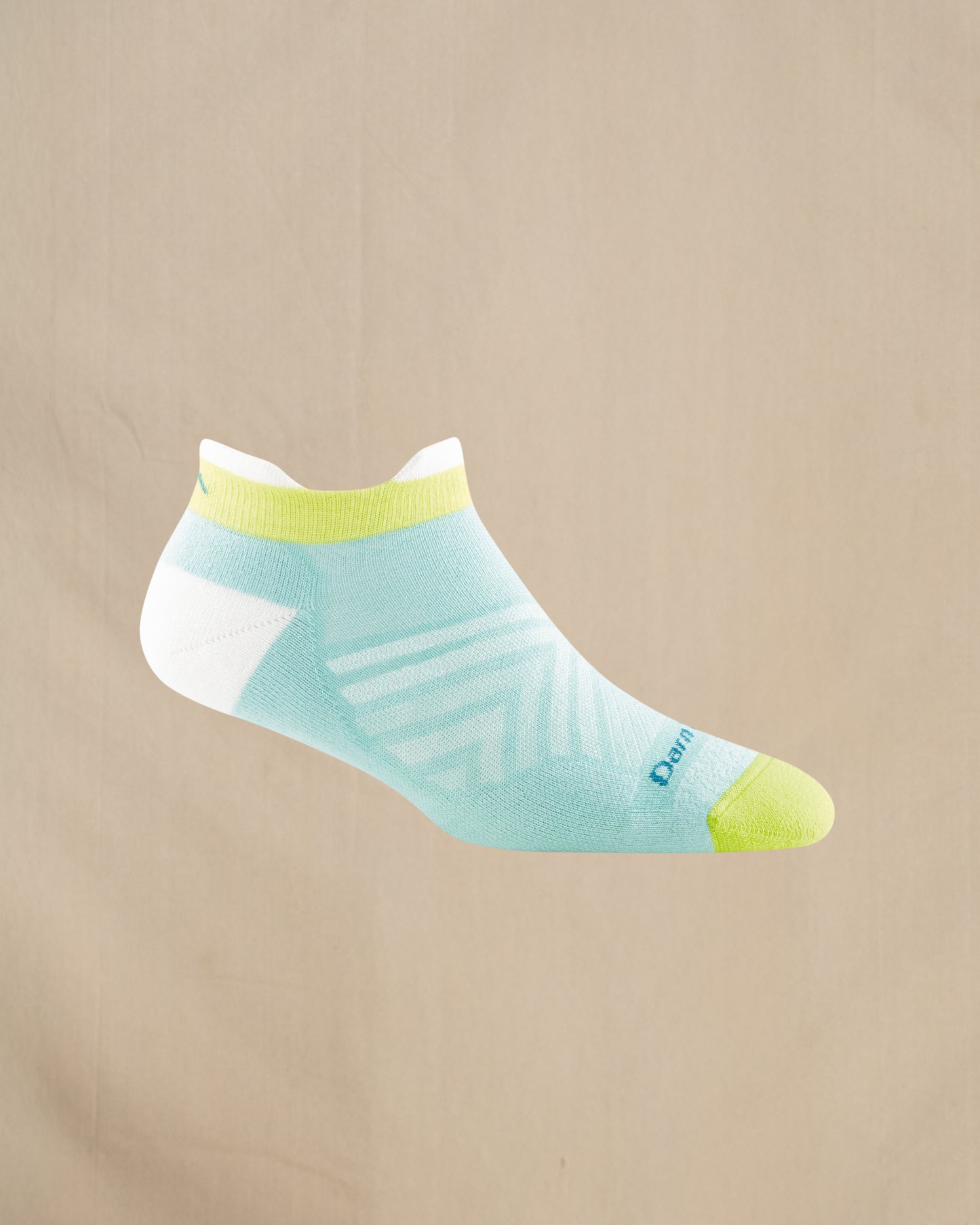 Light blue ankle sock with green accents on a beige background