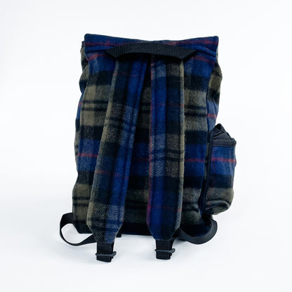 Blue and olive plaid wool backpack with side water bottle pocket, back view