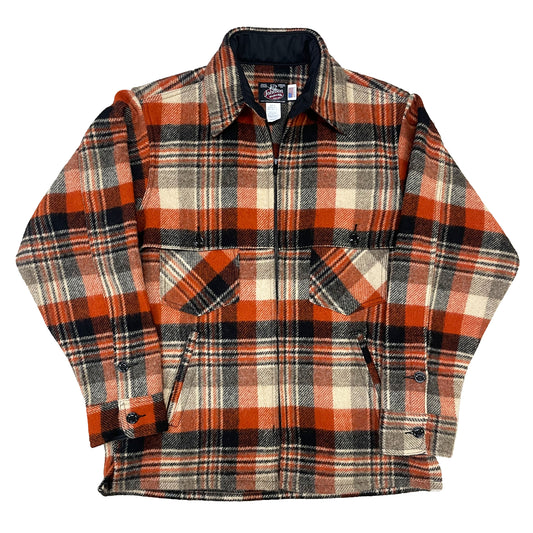 Wool jac shirt with full zipper, two chest pockets and two lower slash pockets. Shown in rust, black and tan plaid