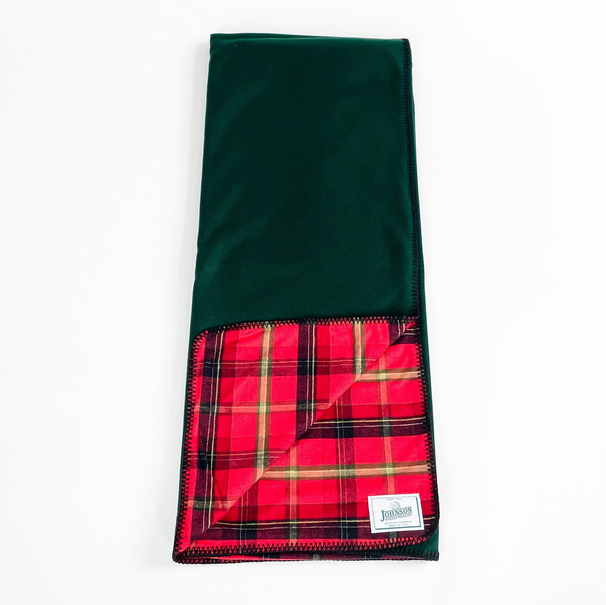 Flannel Wool Throws, spruce green wool outside, flannel red/orange/ yellow inside, front view opened