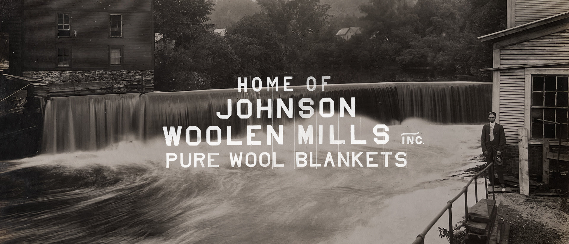 Black and white image of the Johnson waterfall with text overlay saying home of Johnson Woolen Mills pure wool blankets