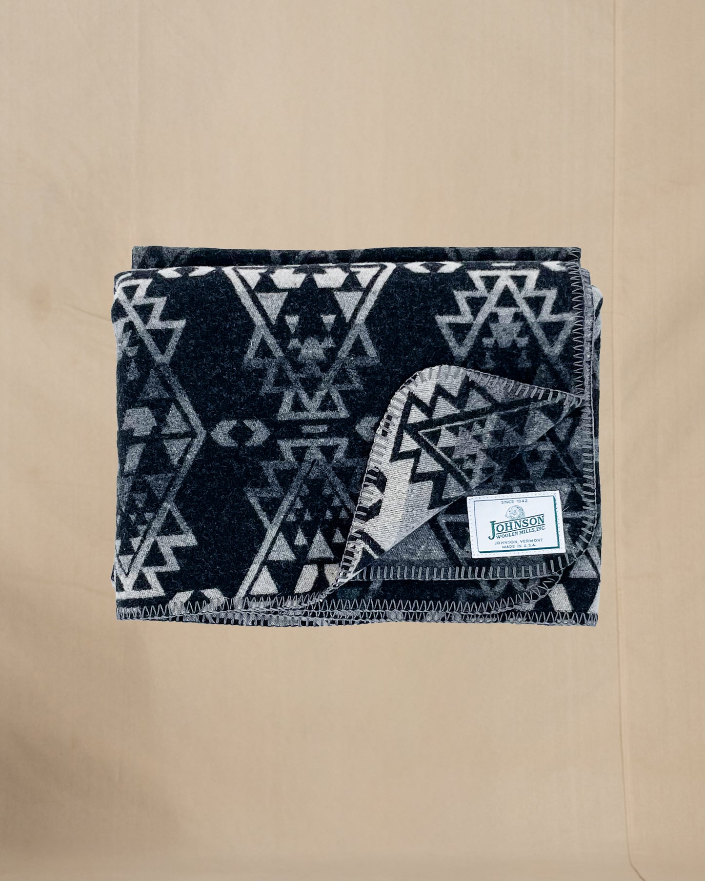 Johnson Woolen Mills throw - black, gray, white native American print, folded