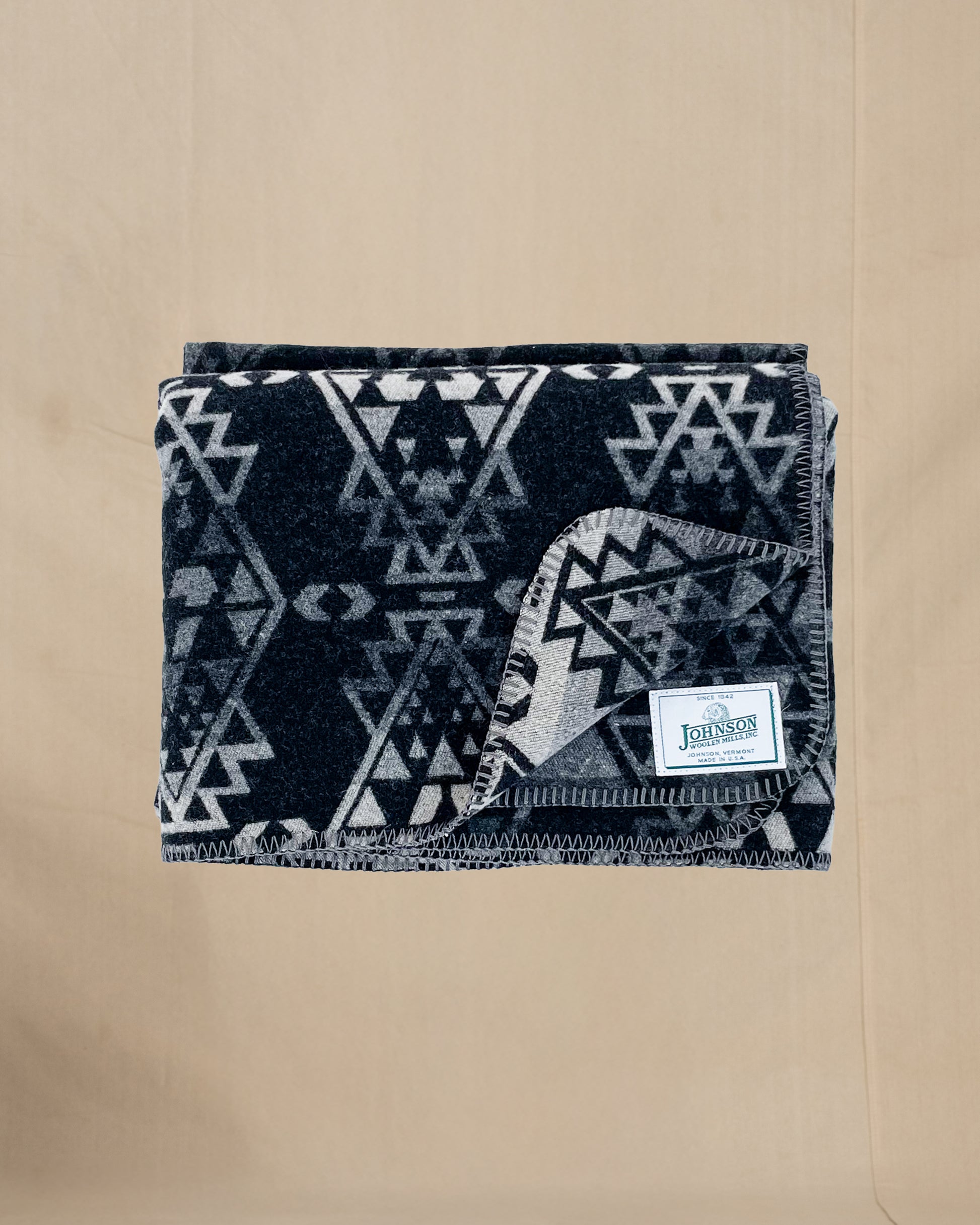 Johnson Woolen Mills throw - black, gray, white native American print, folded
