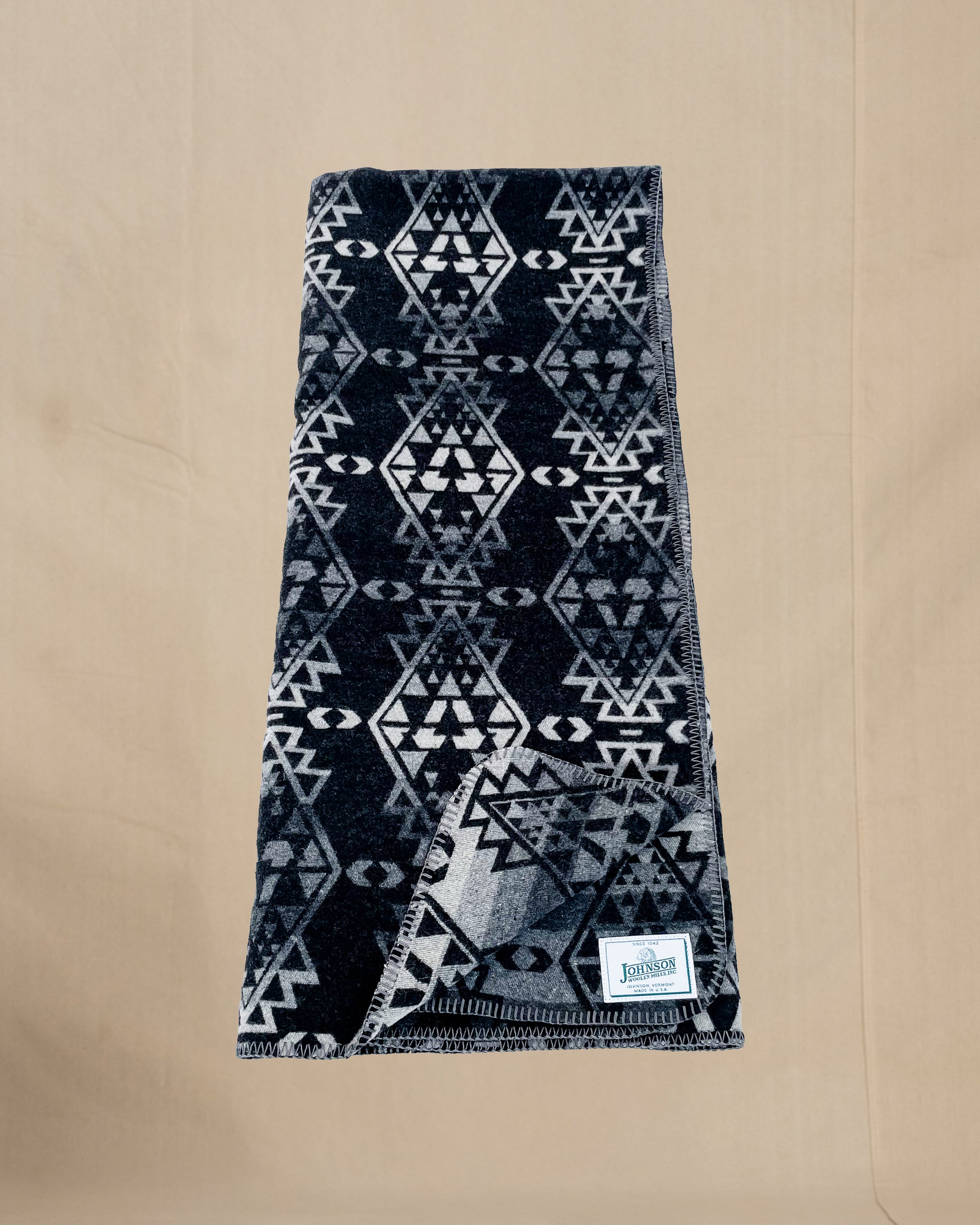 Johnson Woolen Mills throw - black, gray, white native American print, folded long