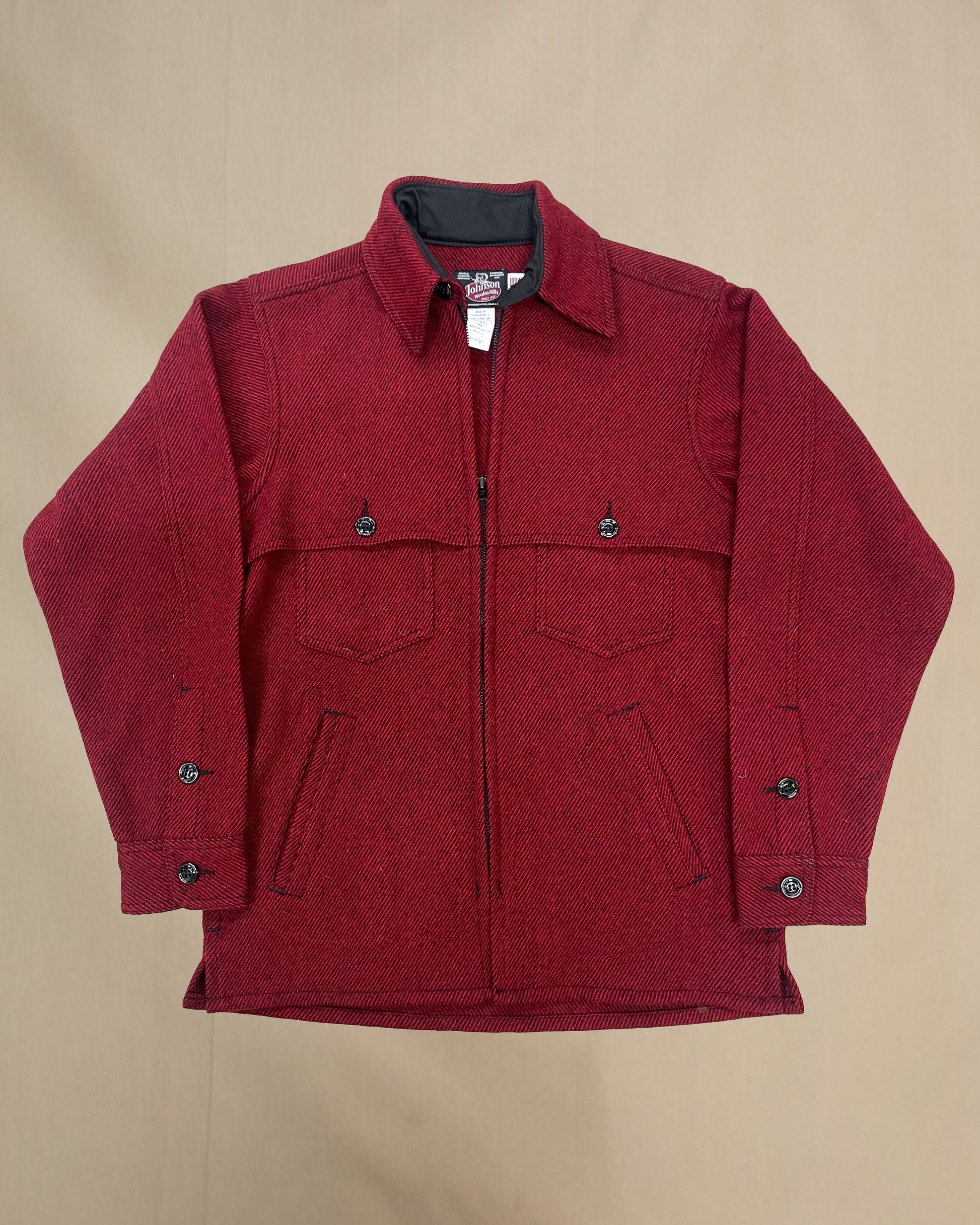 Wool jac shirt with full zipper, two chest pockets and two lower slash pockets. Shown in wine twill