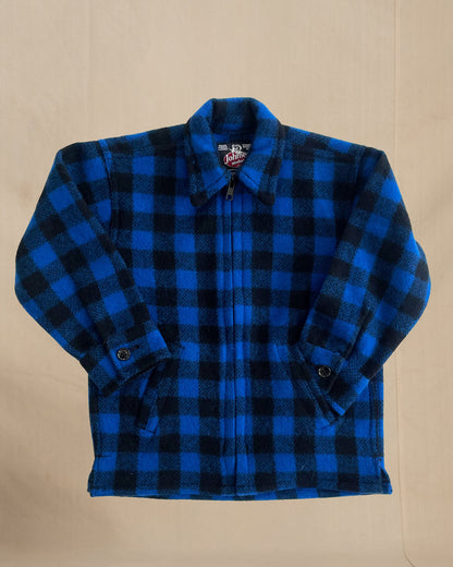 Children's Blue and black checkered jacket on a beige background