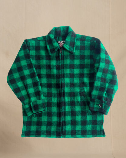 Children's Green and black checkered shirt on a beige background
