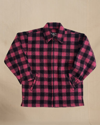 Children's Pink and black checkered shirt on a beige background