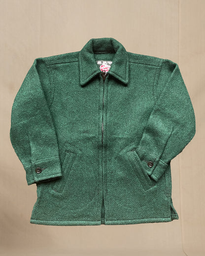 Children's Green jacket on a beige background