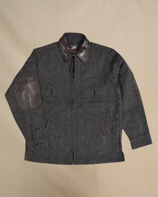 Gray Herringbone jac shirt with leather collar, elbow, and pocket detail.  Front view