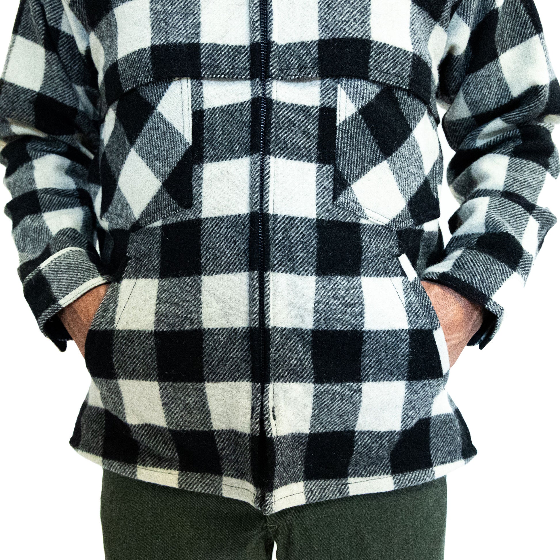Johnson Woolen Mills northwoods x 1842 white and black buffalo check jac shirt on model with hands in pockets