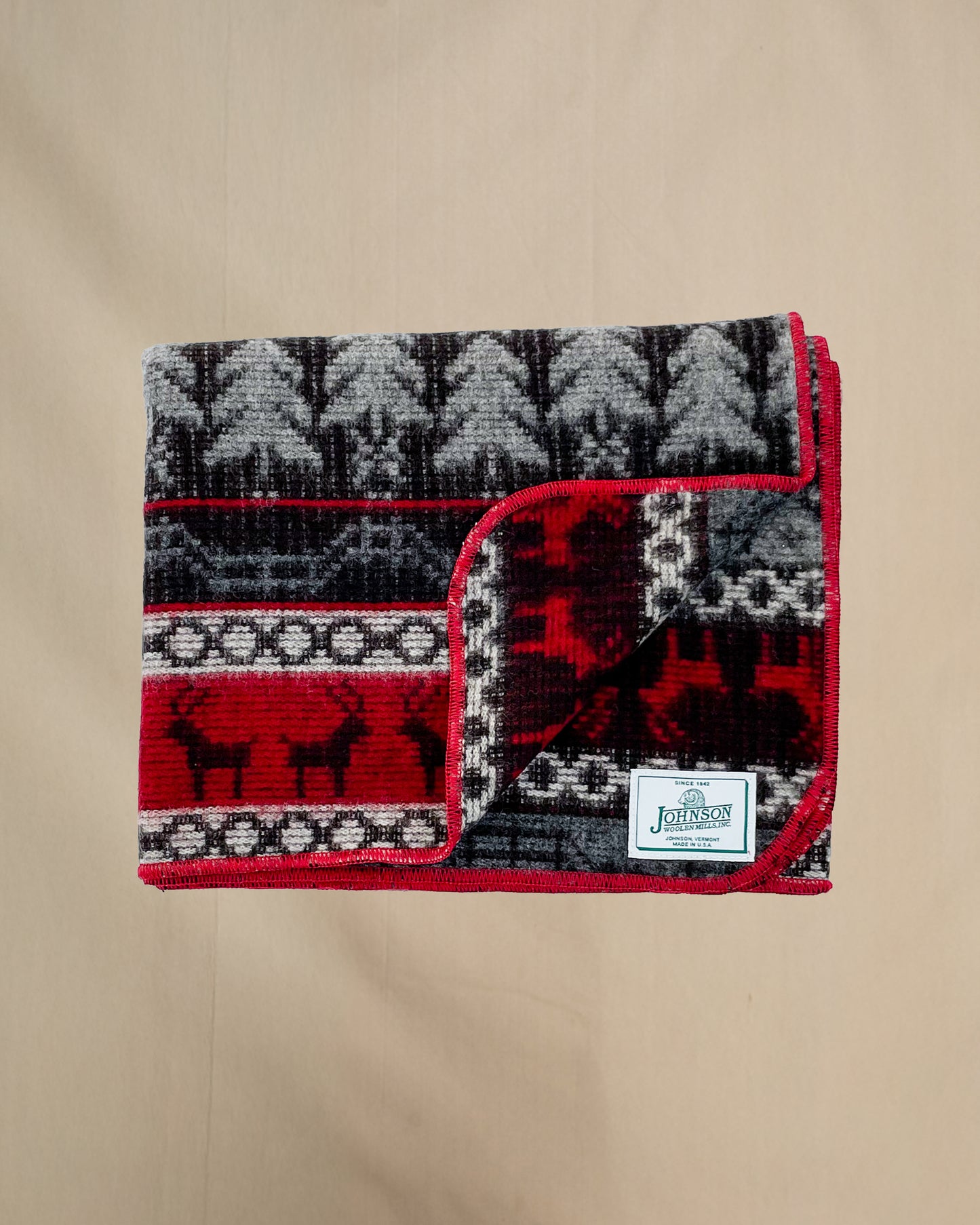 Johnson Woolen Mills Throw, Fenced Wilderness Red/Cream/Gray Print folded view