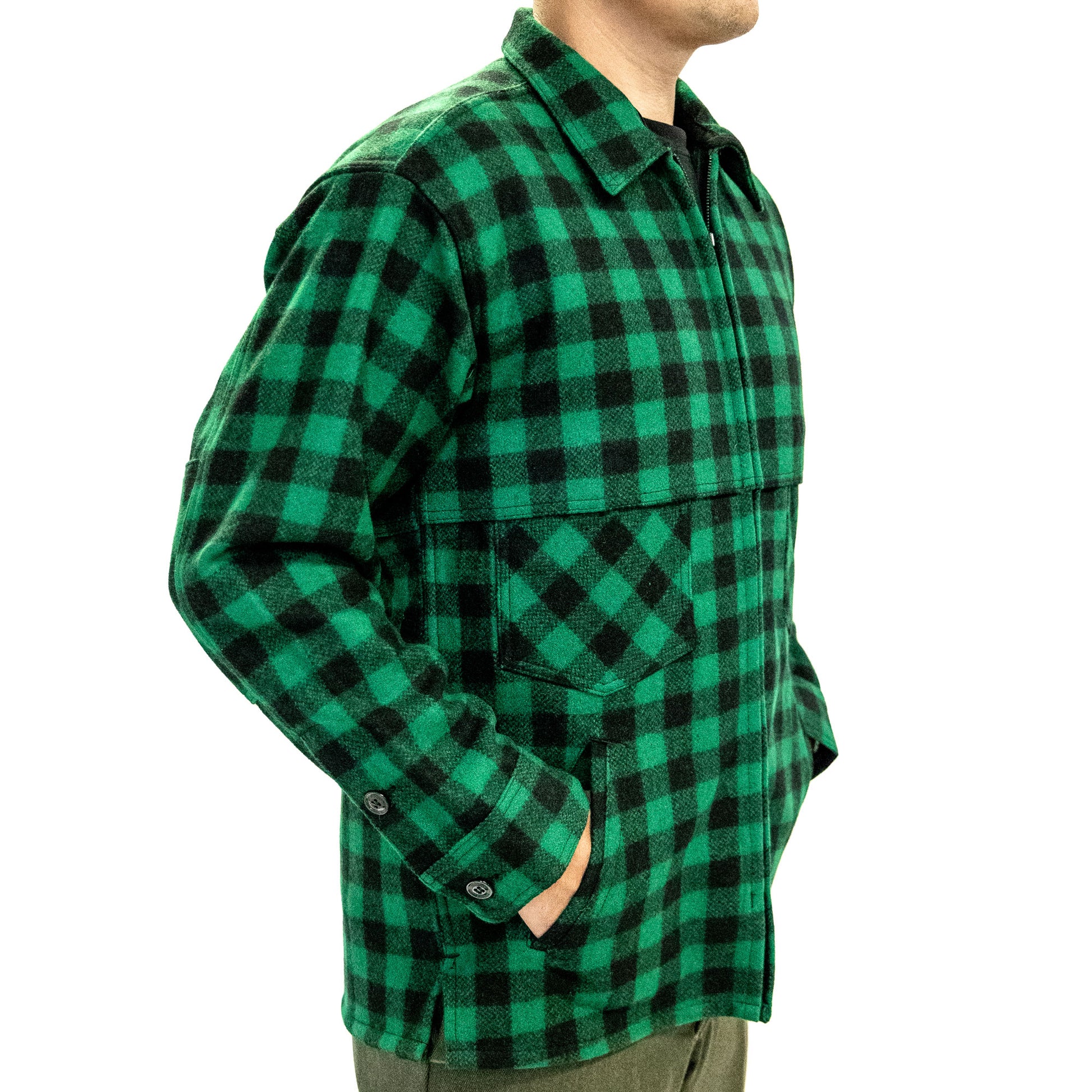 Johnson Woolen Mills northwoods x 1842 green and black buffalo check jac shirt on side view of model with hands in pockets