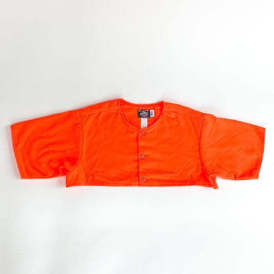 Blaze orange safety cape, designed to work over any Johnson Woolen Mills coat or jacket. Short sleeved, Blaze Orange with three button front & two bottom button holes