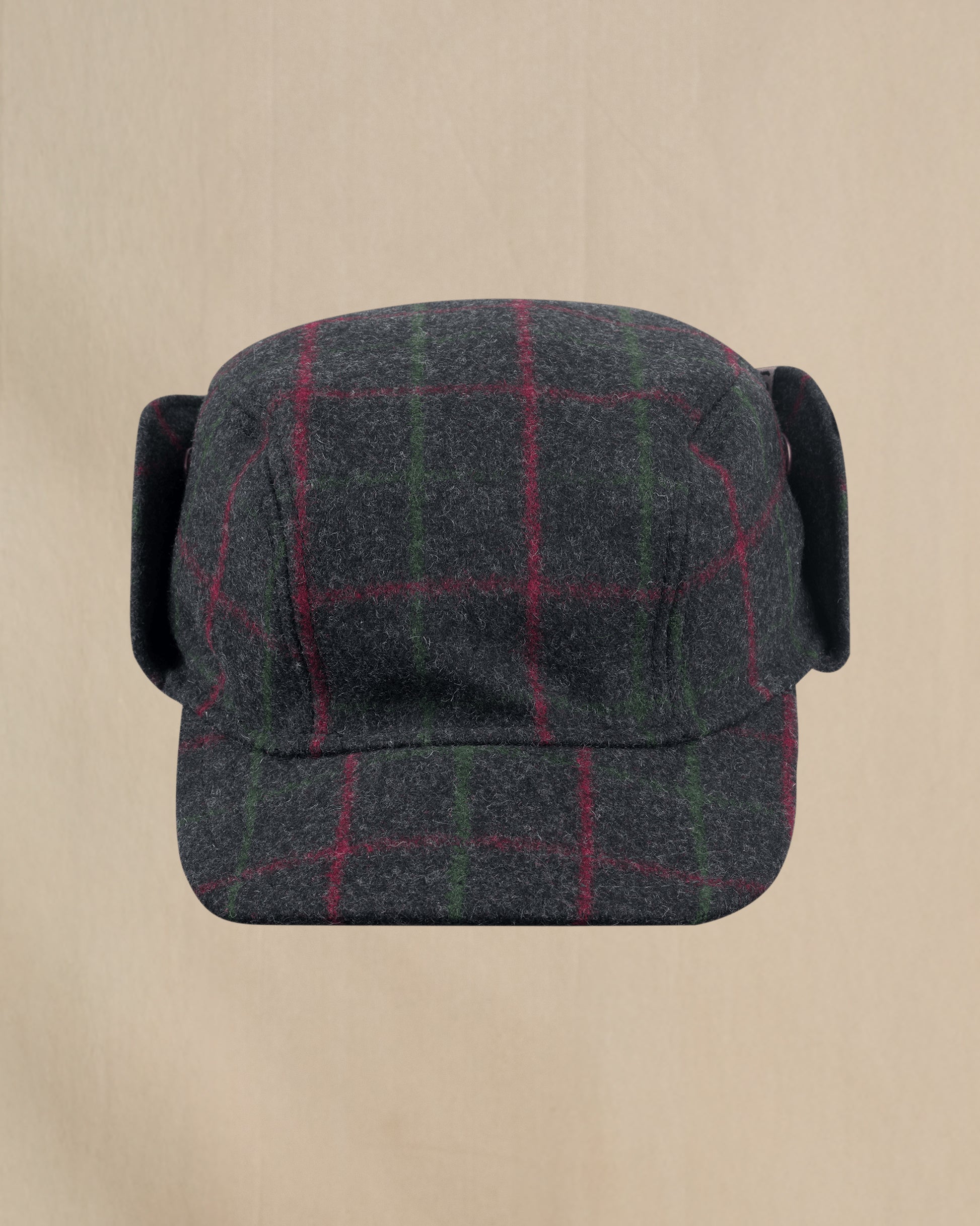 Stormy Kromer Adirondack Plaid Bergland Cap front view with ear flap up 