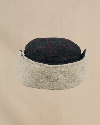Stormy Kromer Adirondack Plaid Bergland Cap back view with ear flap folded up 