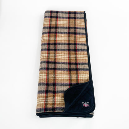 Gold, black and red plaid woolen throw with tan quilted lining