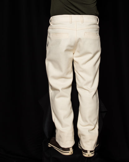 Back side of White-out Tracker Pants 100% White wool on model wearing brown boots
