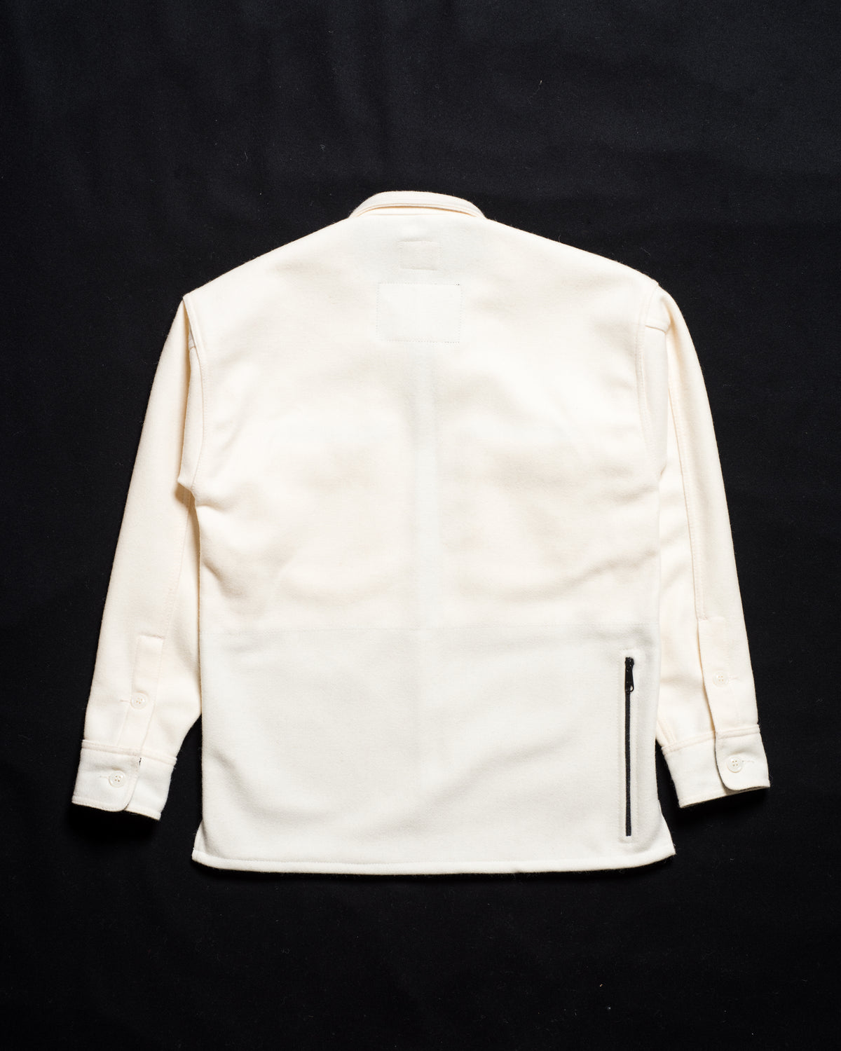 Back of White-out Tracker jacket made from 100% white wool