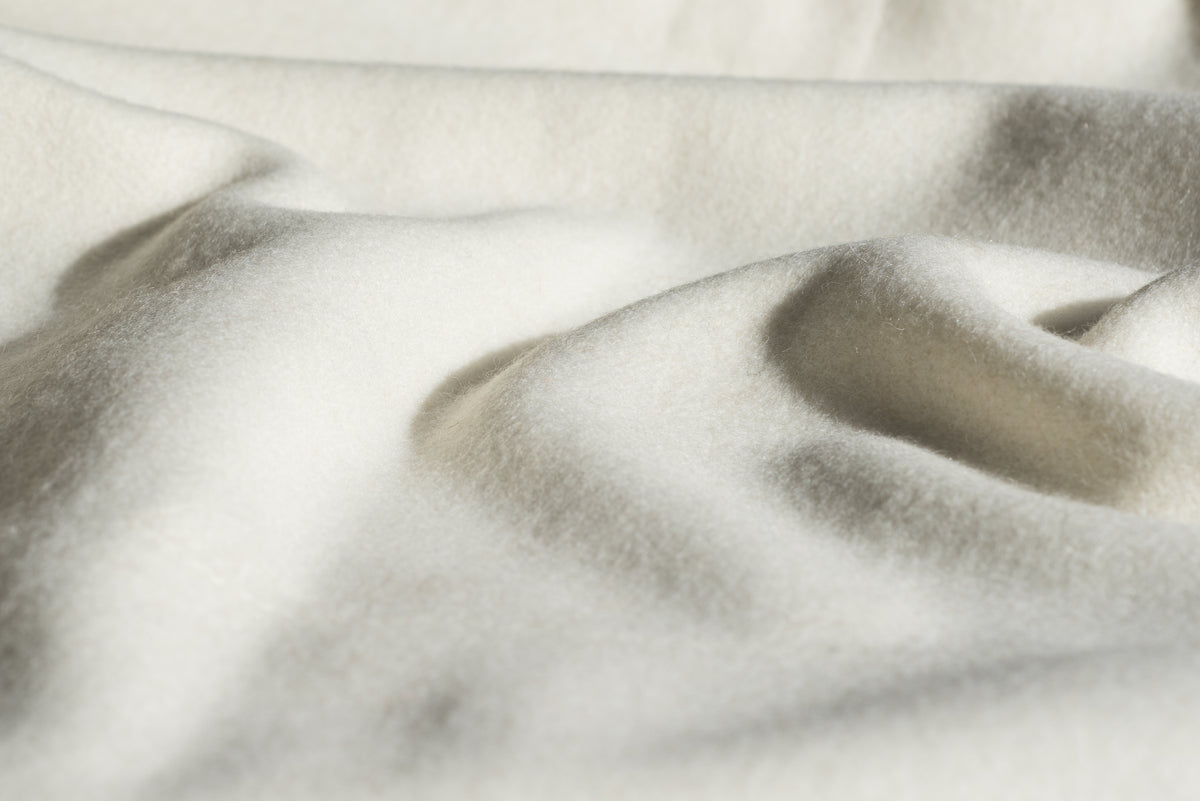 White 100% wool fabric detail