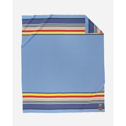 Pendleton Yosemite National Park blanket - light blue with yellow, red, gray and navy stripes on edge