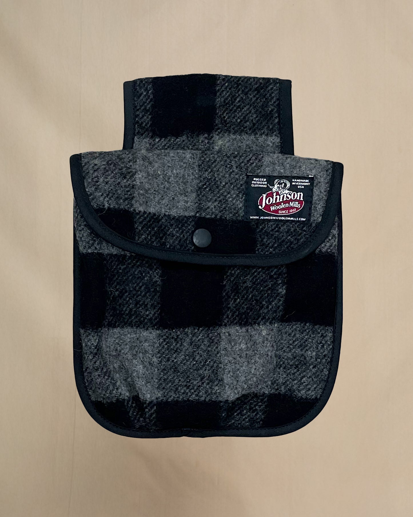 Black powder hunting pouch in gray and black check