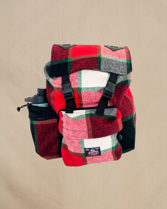 Johnson Woolen Mills Daypack Canadian Plaid Red/Pink/Green/White/ front view with water bottle in side pocket