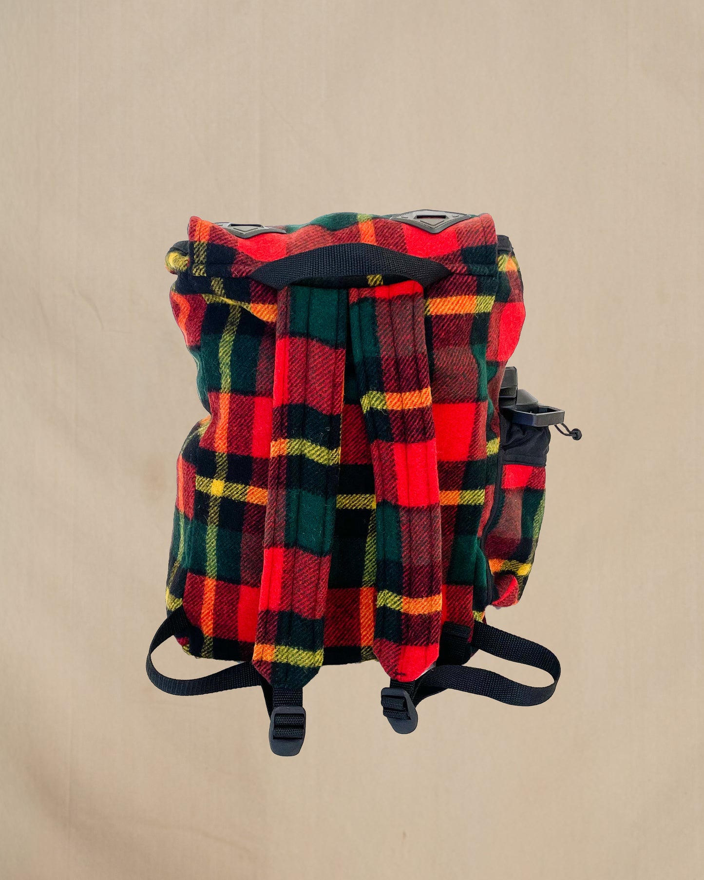 Johnson Woolen Mills Daypack Bright Red/Green/Yellow back view with water bottle in side pocket